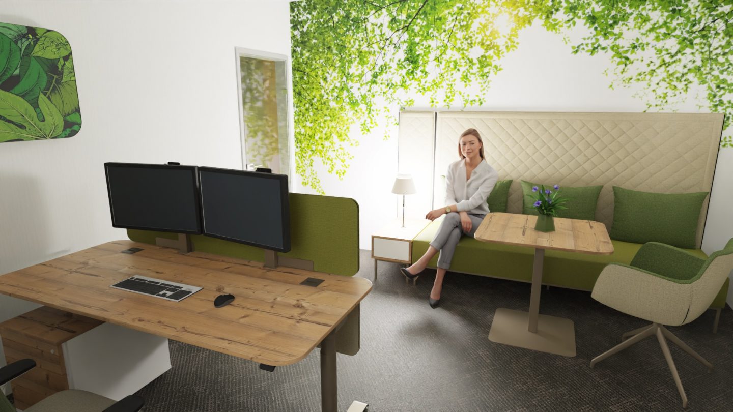 Moderne Büroeinrichtung mit Schreibtisch, Doppelmonitor und grüner Sitzecke.